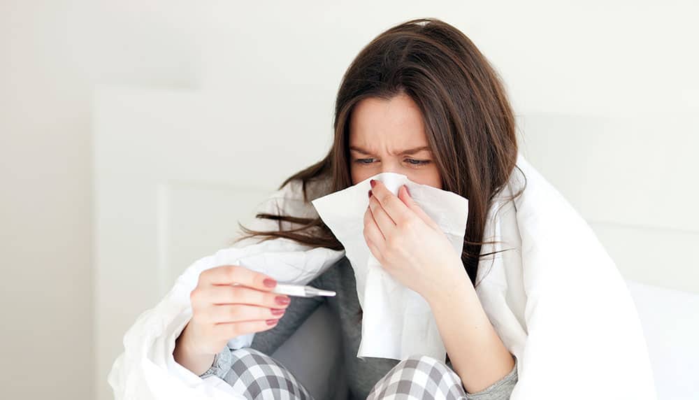 Woman sick with cold